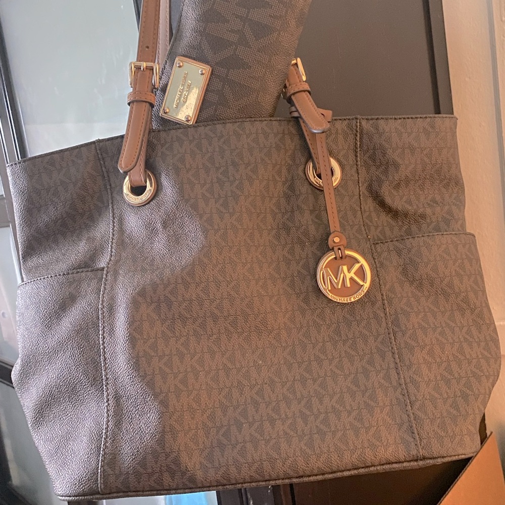 Authentic brown Michael Kors bag with matching wallet